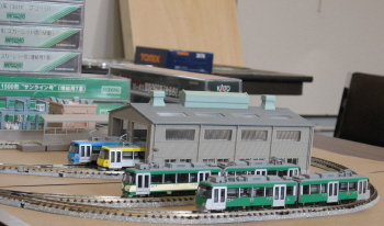 Modemo Tokyu 300-series LRVs at the carbarn.